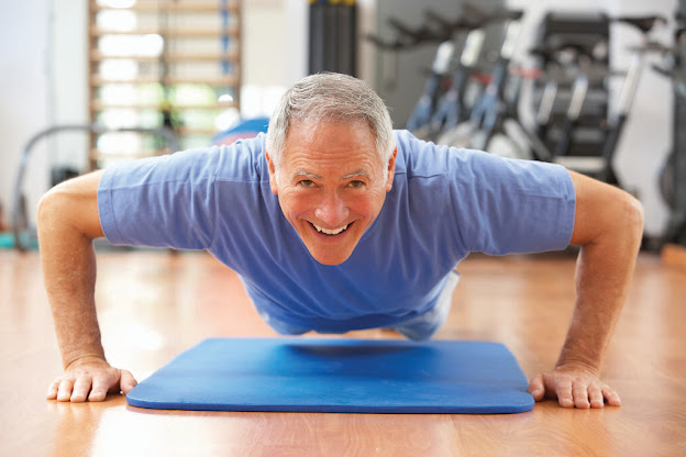 old man push up with a good smile