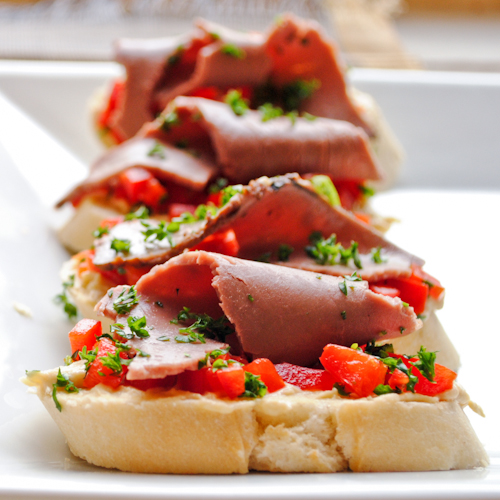 Hummus, Red Pepper, and Roast Beef Crostini Neighborfood