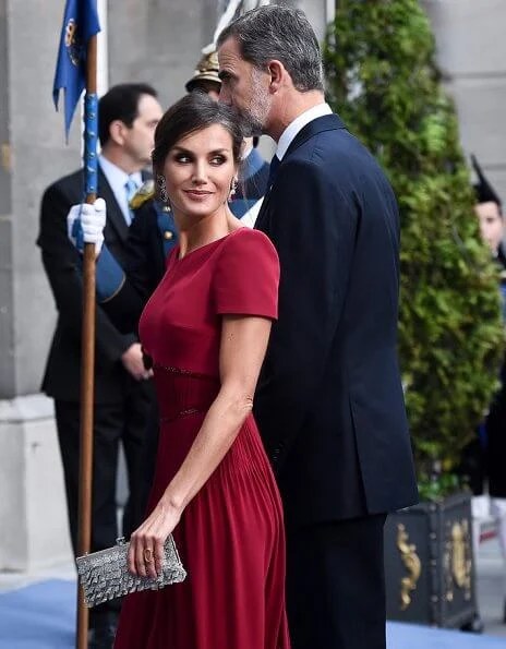 Queen Letizia, Queen Sofia, Crown Princess Leonor and Infanta Sofia. Queen Letizia wore a red satin dress and earrings