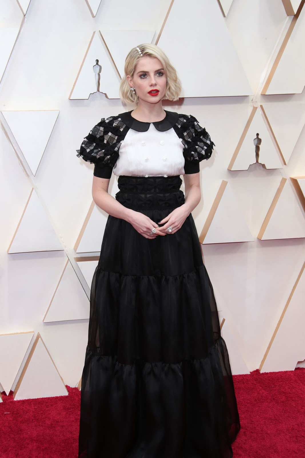 Lucy Boynton arrives in monochrome Chanel to the 2020 Oscars in Hollywood