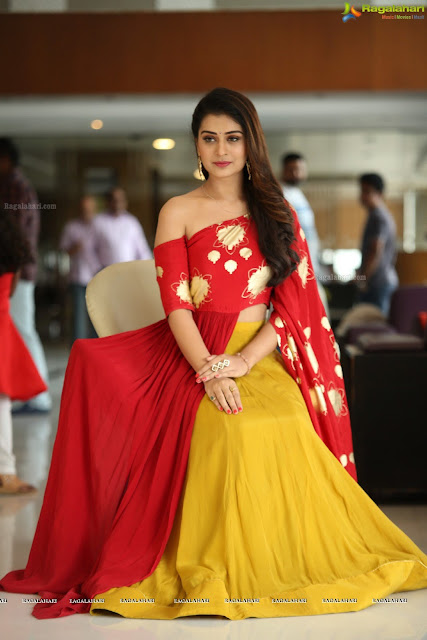 Hot actress PAYAL RAJPUT latest stills in red designer dress