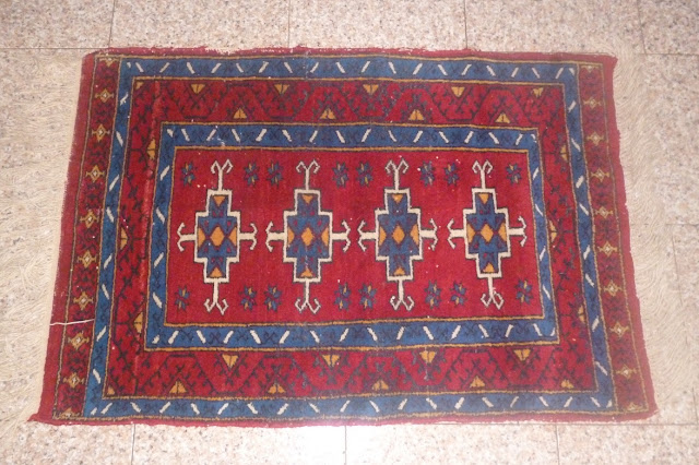 tappeto di bukhara yomut sporco da pulire