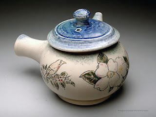 Teapot with mishima dogwood and bird by Lori Buff