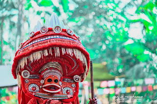 Vayanattu kulavan Theyyam  photo