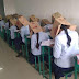 Indian school apologises after photos of students wearing cardboard boxes on their heads during an exam goes viral