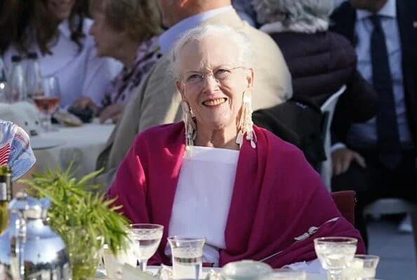 Queen Margrethe attended the World Ballet 2019 at Mollerup Estate. Queen's gold earrings and floral summer skirt