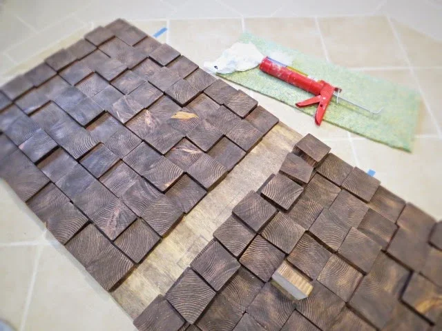 gluing wood blocks to plywood with construction adhesive