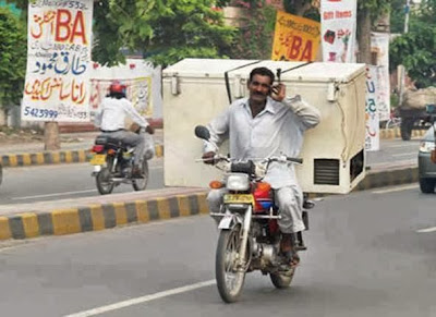 carrying deep freezer on motorcycle amazing Pakistan