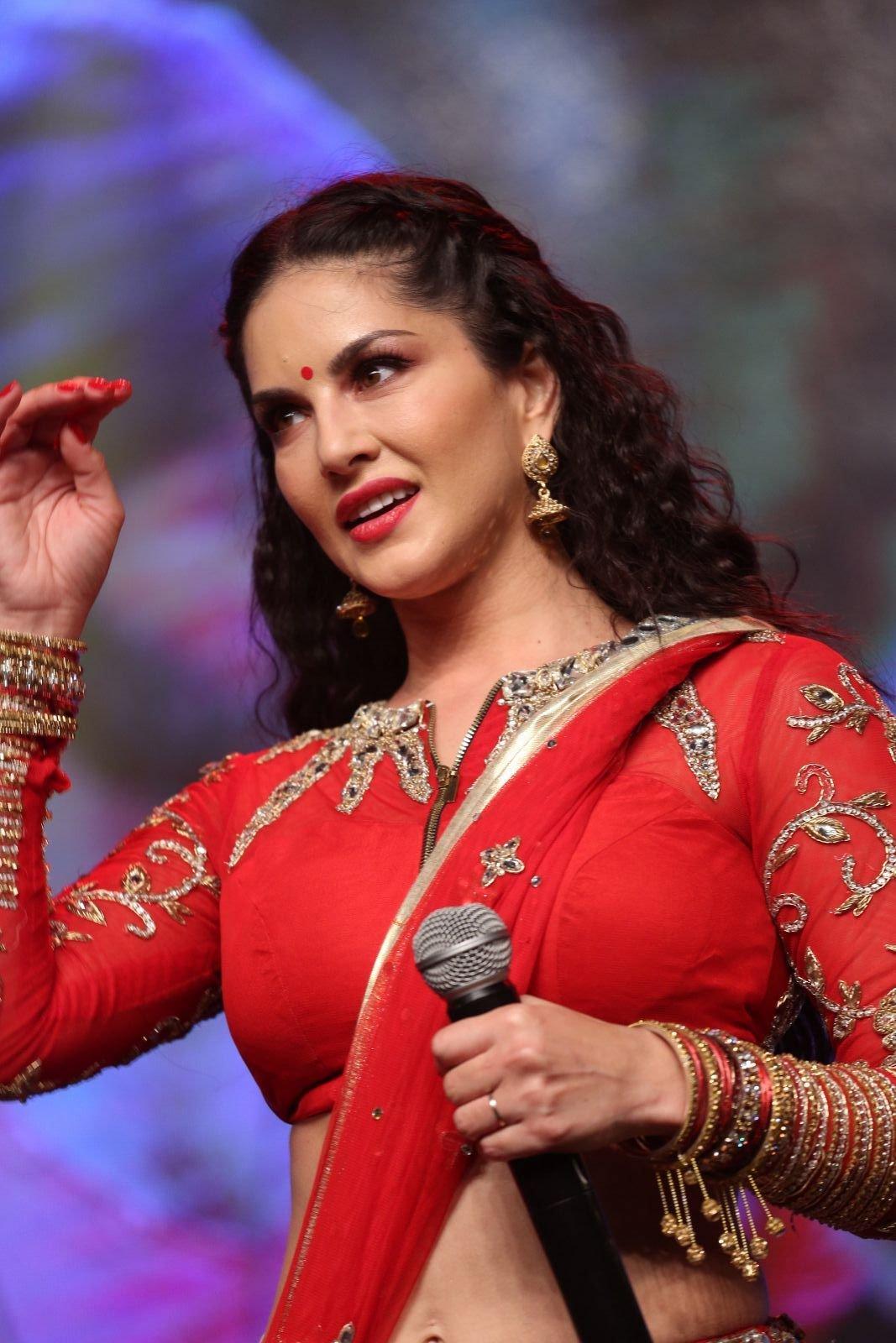 Sunny Leone Looks Super Sexy In a Red Revealing Dress At Telugu Film â