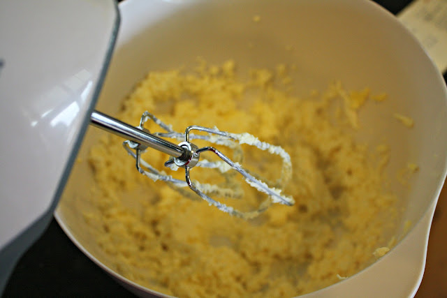 A bowl of dough with Cookie press