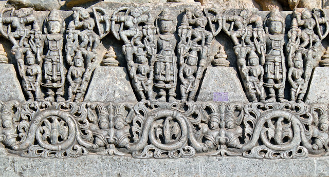 close up one more set of sculptures on the top rows of the wall friezes