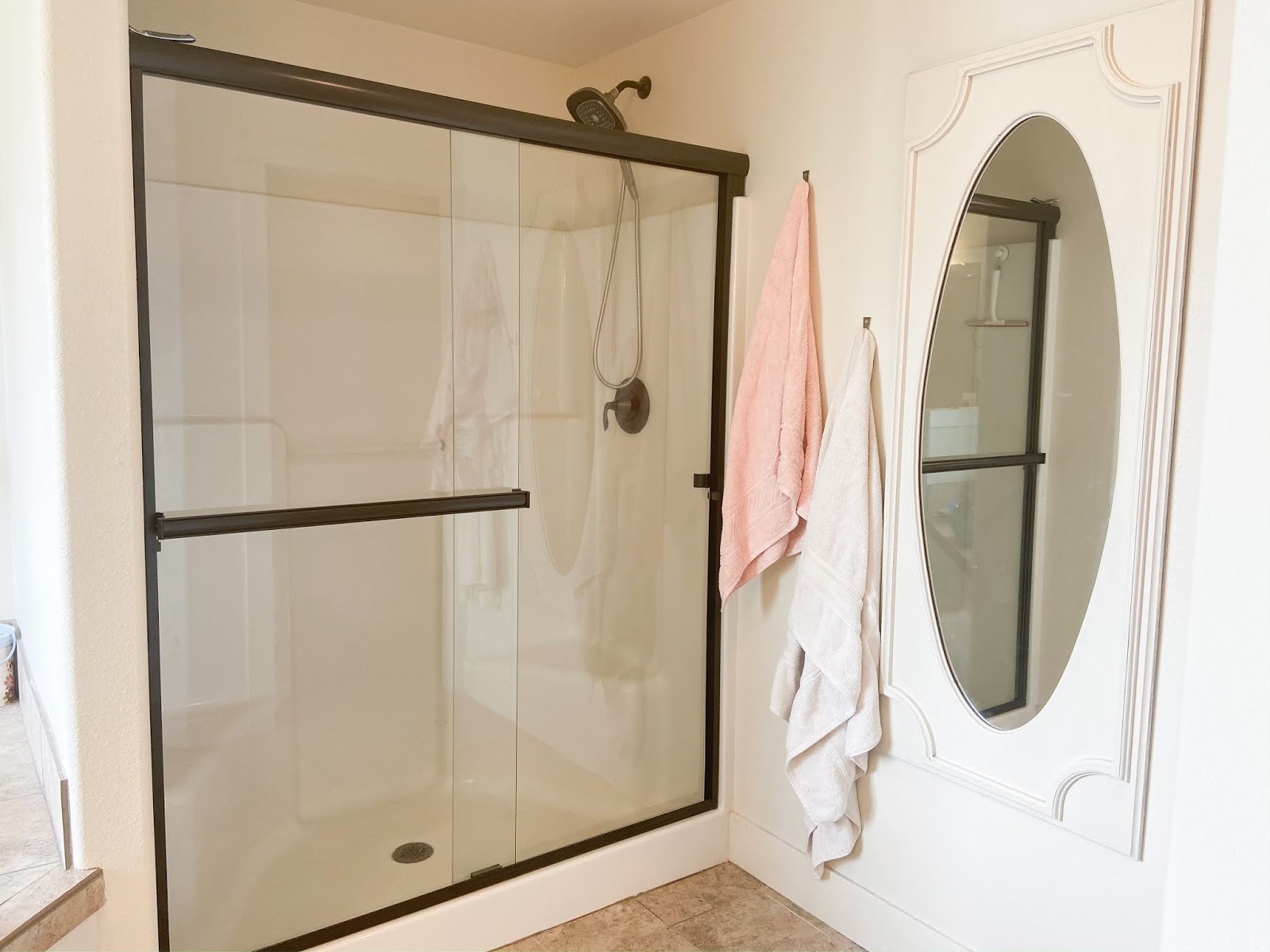 How to keep your glass shower door clean and clear! behind the diy