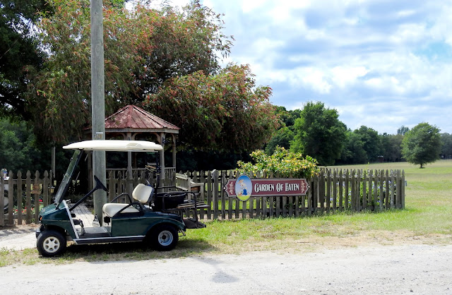 Small fenced patio area at Hillbilly Farms bakery, titled "Garden of Eaten".