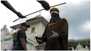 Penganut Kristen dihukum cambuk di Aceh: 'Saya pilih dicambuk ketimbang dipenjara'