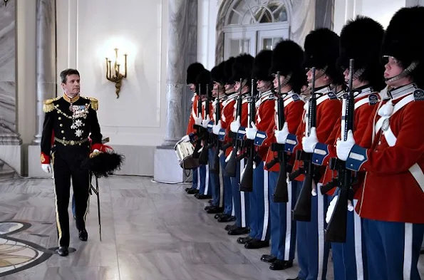 Crown Prince Frederik, Crown Princess Mary, Prince Jaochim and Princess Marie attend New Year's Banquet at Amalienborg Palace. Crown Princess Mary diamon tiara, Princess Marie diamond tiara, diamond earrings, Princess Mary wore diamond earrings wore satin govn and cape