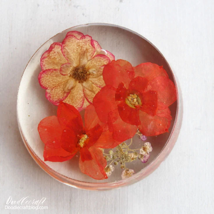 paperweights are jewelry for the desk--clear polyester resin with pressed flowers are beautiful