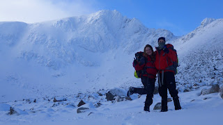Richard and Carmen with Fiacaill Ridge behind in Coire an t-Sneachda Cairngorms