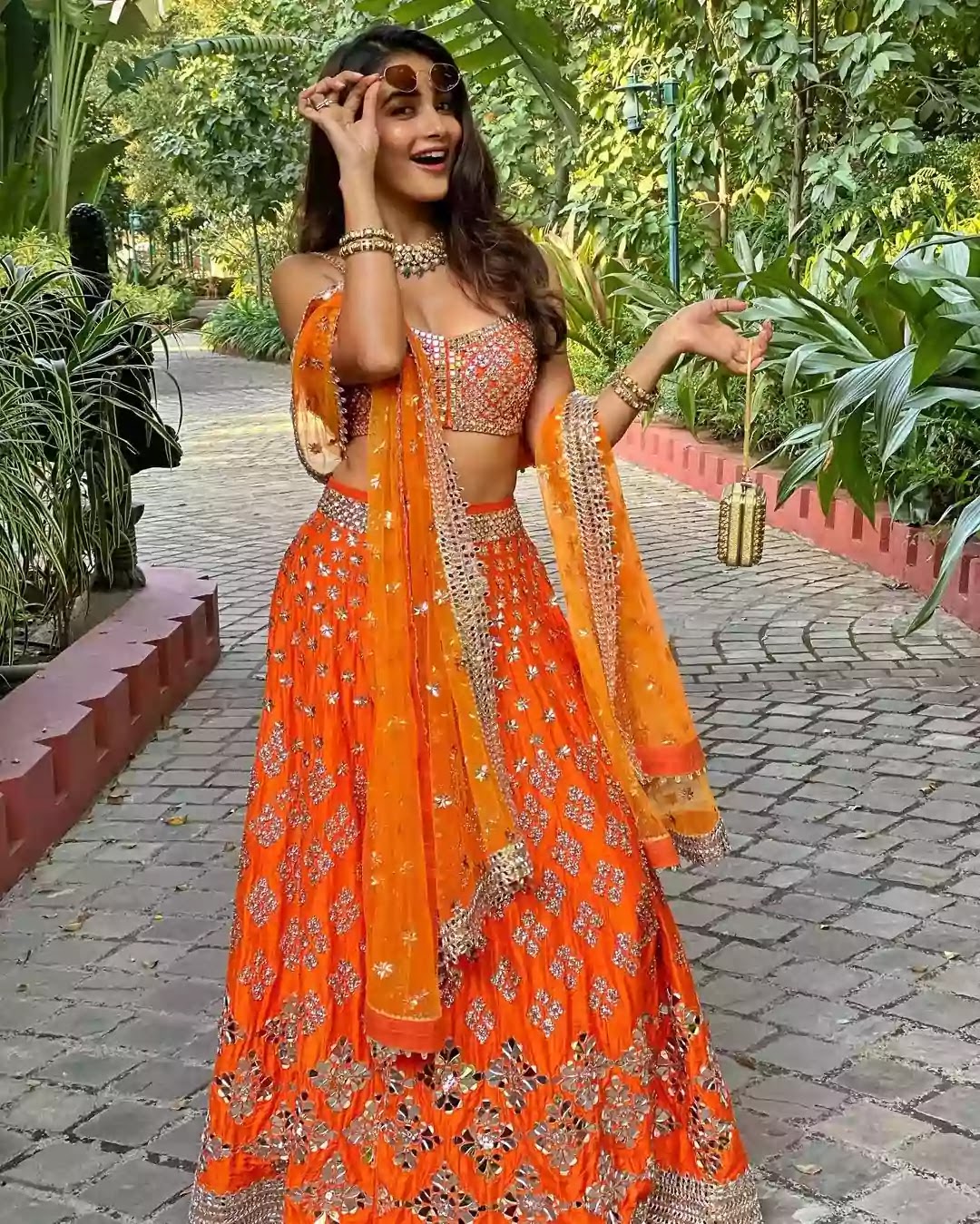 pooja-hegde-in-orange-lehenga pooja-hegde-in-orange-lehenga