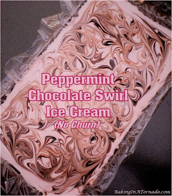 Peppermint Chocolate Swirl Ice Cream, NO CHURN, studded with peppermint candy pieces and swirled with chocolate syrup. | Recipe developed by www.BakingInATornado.com | #recipe #ValentinesDay