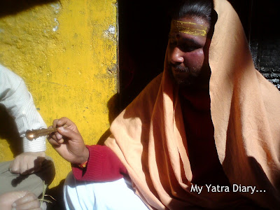 Priest chants holy mantras for the devotees