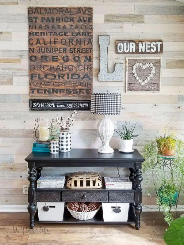wood walls with black and white farmhouse decor
