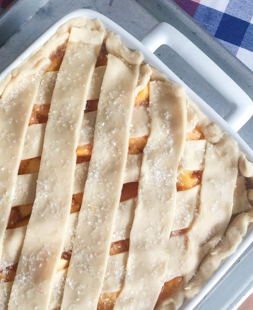 Fresh Peach Cobbler made with a bottom crust and a lattice crust on the top that gives the taste of peach dumplings with every bite! 