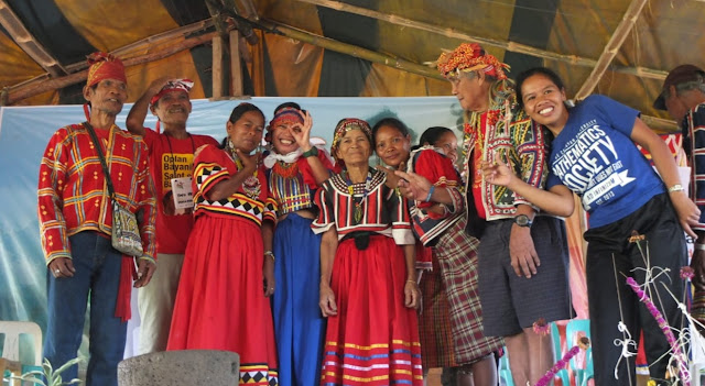 Czarina with Lumads during the “Kahimunan sa Katungod” (Rights Act), a part of the Healing the Hurt Project of the Rural Missionaries of the Philippines Northern Mindanao region (RMP-NMR). Mindanao, 2016