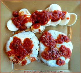 Crispy Baked Eggplant Parmesan: Eggplant slices coated in a seasoned breadcrumb mixture then baked, not fried. Add cheese and Homemade Marinara for a flavorful dinner | Recipe developed by www.BakingInATornado.com | #dinner 