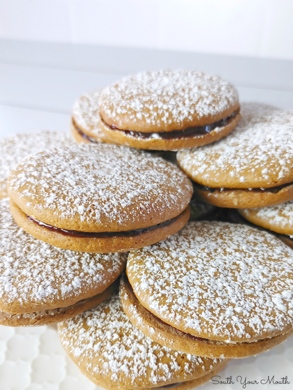 Jim Jams! An old-fashioned heirloom cookie recipe for molasses cookie sandwiches filled with raspberry jam.