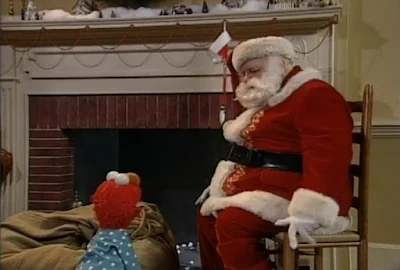 Santa Claus and Elmo. Sesame Street Elmo Saves Christmas