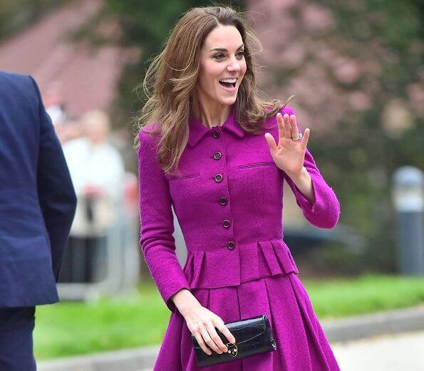Kate Middleton wore Oscar de la Renta burgundy jacket and pleated skirt, Zoraida gold earrings, and she carred Aspinal of London clutch