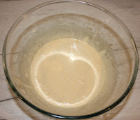 Wet ingredients after whisking. It looks like a pale brown soup.