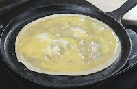 Adding-Eggs-for-kathi-roll