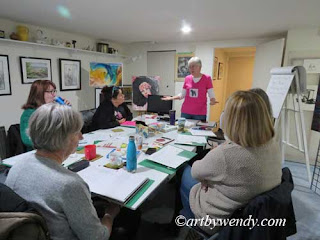 Wendy working with a group of artists on Marketing Strategies