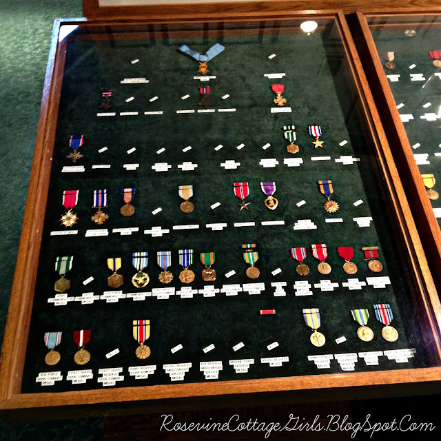 Display case of military medals from the Museum of the Barrens in Barren County Kentucky by Rosevine Cottage Girls