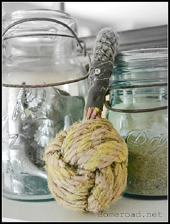 a sailor's knot, jars of sand and shells