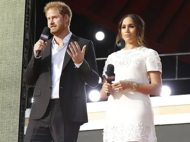Meghan Markle wore a new floral-embellished mini shift dress by Valentino. Prince Harry