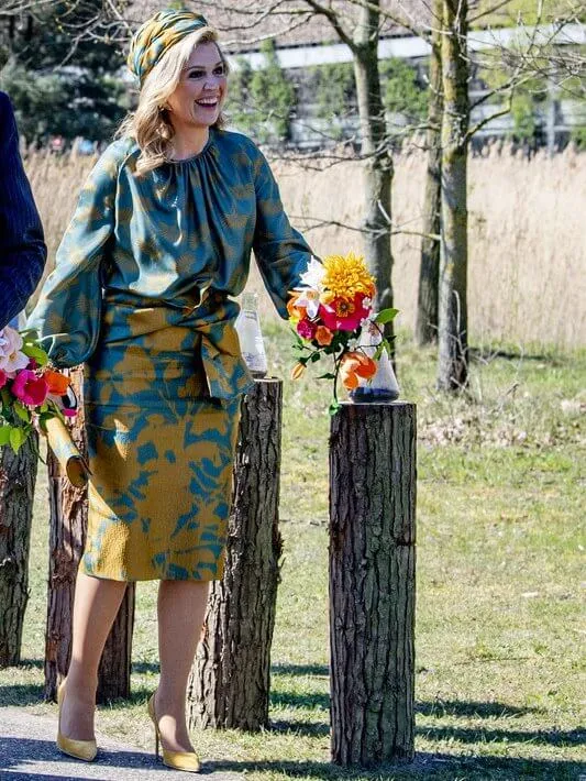Princess Alexia wore a beige knit cardigan and dress by Maje. Amalia wore a blouse by Natan. Maxima wore a silk skirt and top by Natan