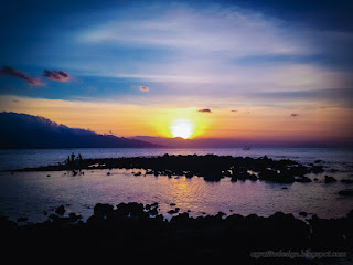 Colorful Sunset Panorama On Tropical Rocky Fishing Beach At The Village Umeanyar North Bali Indonesia