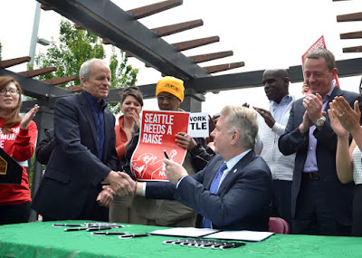 Seattle Mayor Ed Murry Signs Seattle Minimum Wage Ordinance, 3 June 2014 - Source: http://murray.seattle.gov/seattle-mayor-ed-murray-signs-minimum-wage-bill/