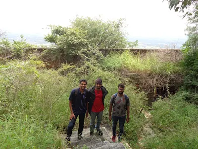 The krew taking a photo amidst the shrubs and greenery on our way down