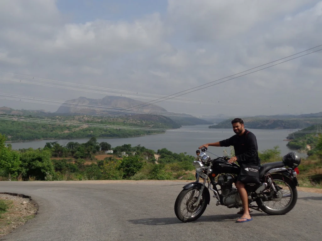 Savandurga View: A wide view of the Savandurga monolithic hill from the surrounding area.