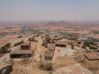 The layers with granaries and other storage complexes on top of the pavagada fort hillock