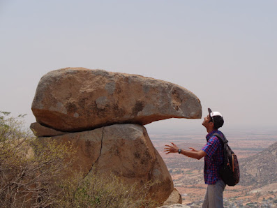 Dattu kissing a boulder in the pavagada trek
