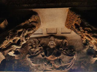 Detailed, scary-looking stone carvings at the Badami complex