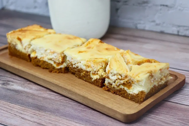 Carrot Cake Swirled Cheesecake Bars