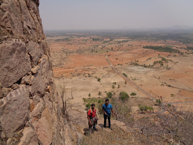 Hikers well on top of the base line, trying to find a way to the top of Bhasmangi