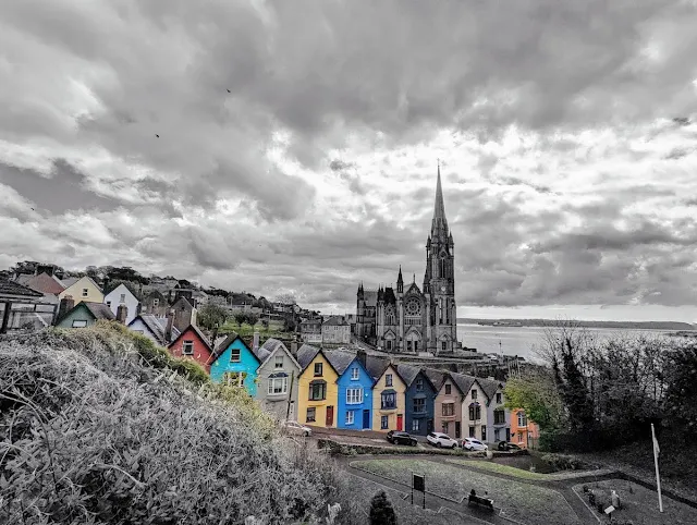 Cork to Cobh: Colorful Deck of Cards Houses on a black and white background