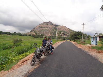 The krew on a small pitstop, with channarayanadurga in the background