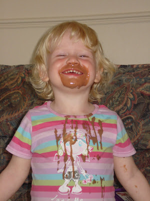 Cousin wearing a chocolate milkshake